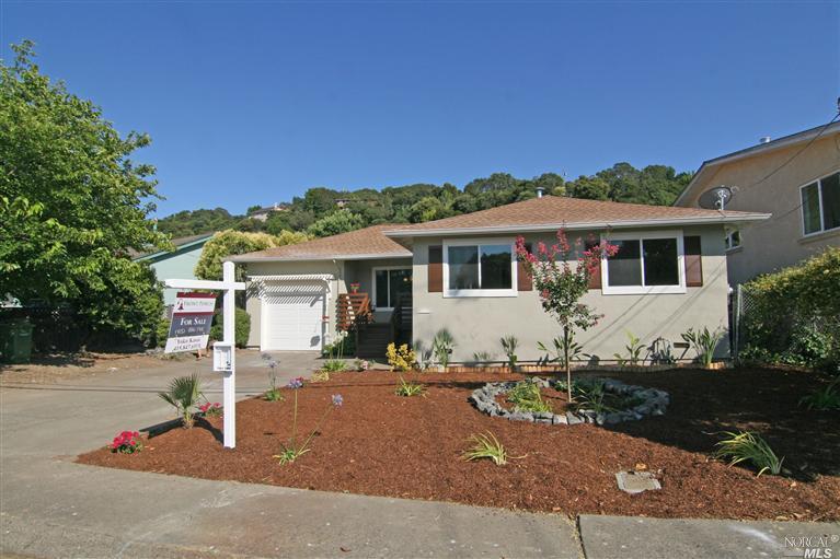 400 Adrian Way San Rafael, CA 94903 - Photo 1 of 1 a front view of a house with a tree