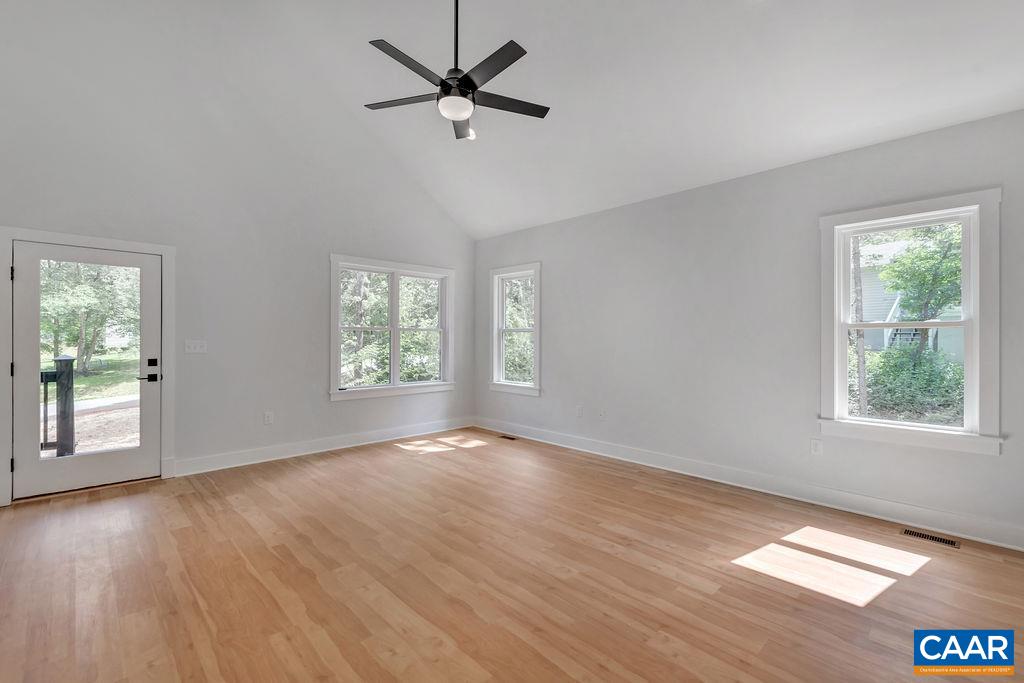 24 Begum Road Palmyra, VA 22963 - Photo 12 of 47 a view of an empty room with wooden floor and a window