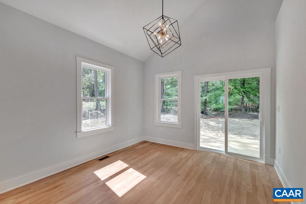 24 Begum Road Palmyra, VA 22963 - Photo 24 of 47 a view of empty room with wooden floor and fan