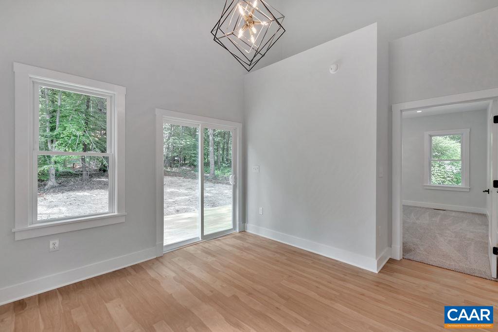 24 Begum Road Palmyra, VA 22963 - Photo 25 of 47 wooden floor in an empty room with a window