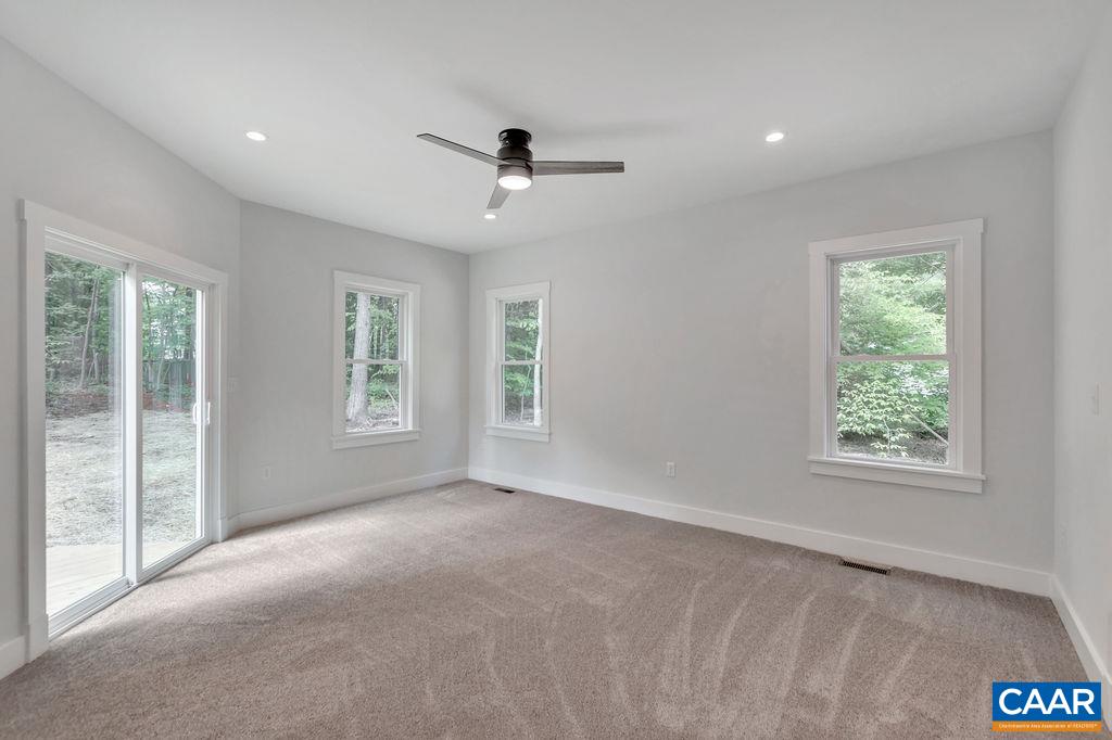 24 Begum Road Palmyra, VA 22963 - Photo 27 of 47 a view of a livingroom with a ceiling fan and window