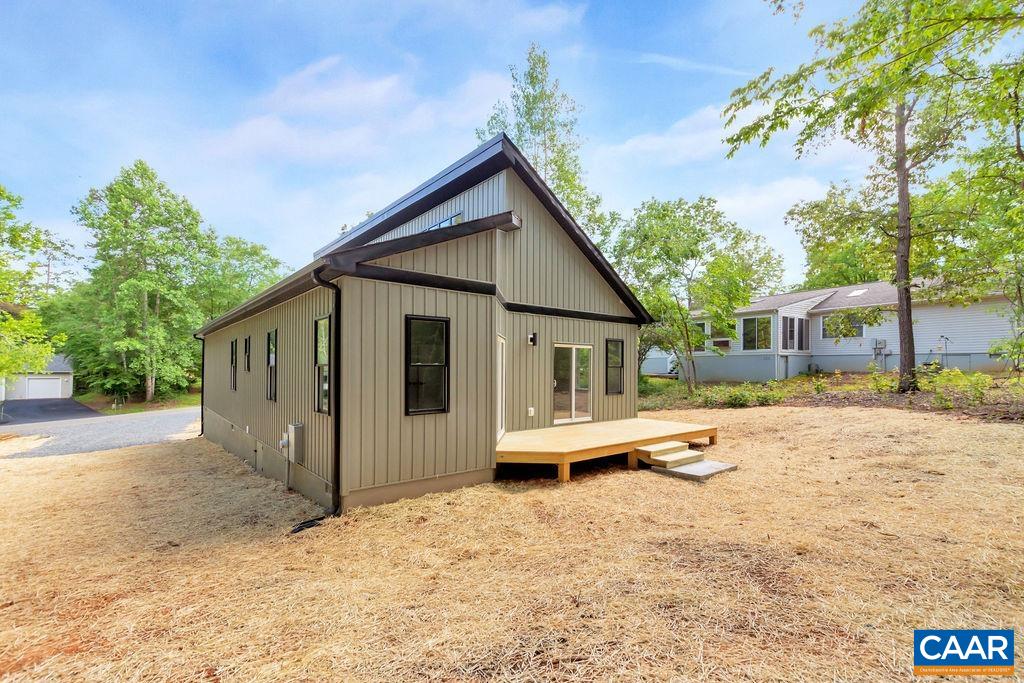24 Begum Road Palmyra, VA 22963 - Photo 45 of 47 a view of house with backyard and trees in the background