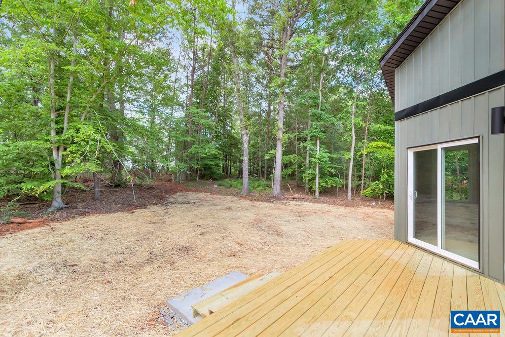 24 Begum Road Palmyra, VA 22963 - Photo 46 of 47 a view of a backyard with large trees and plants