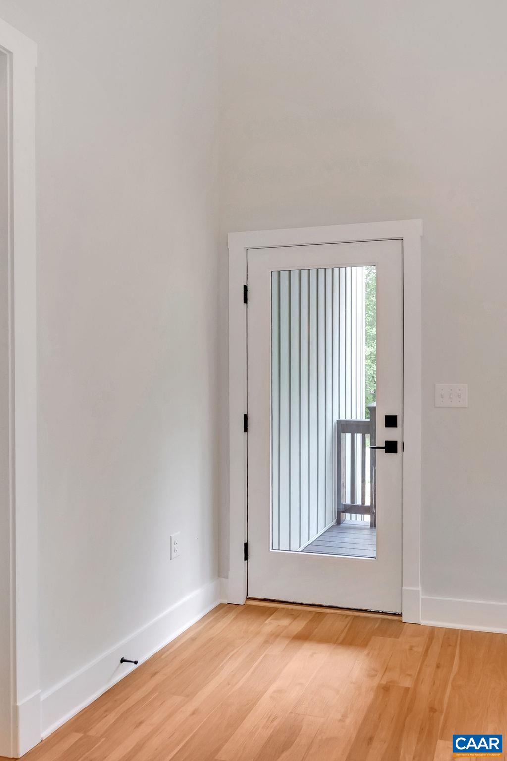 24 Begum Road Palmyra, VA 22963 - Photo 10 of 47 a view of an empty room with wooden floor and a window