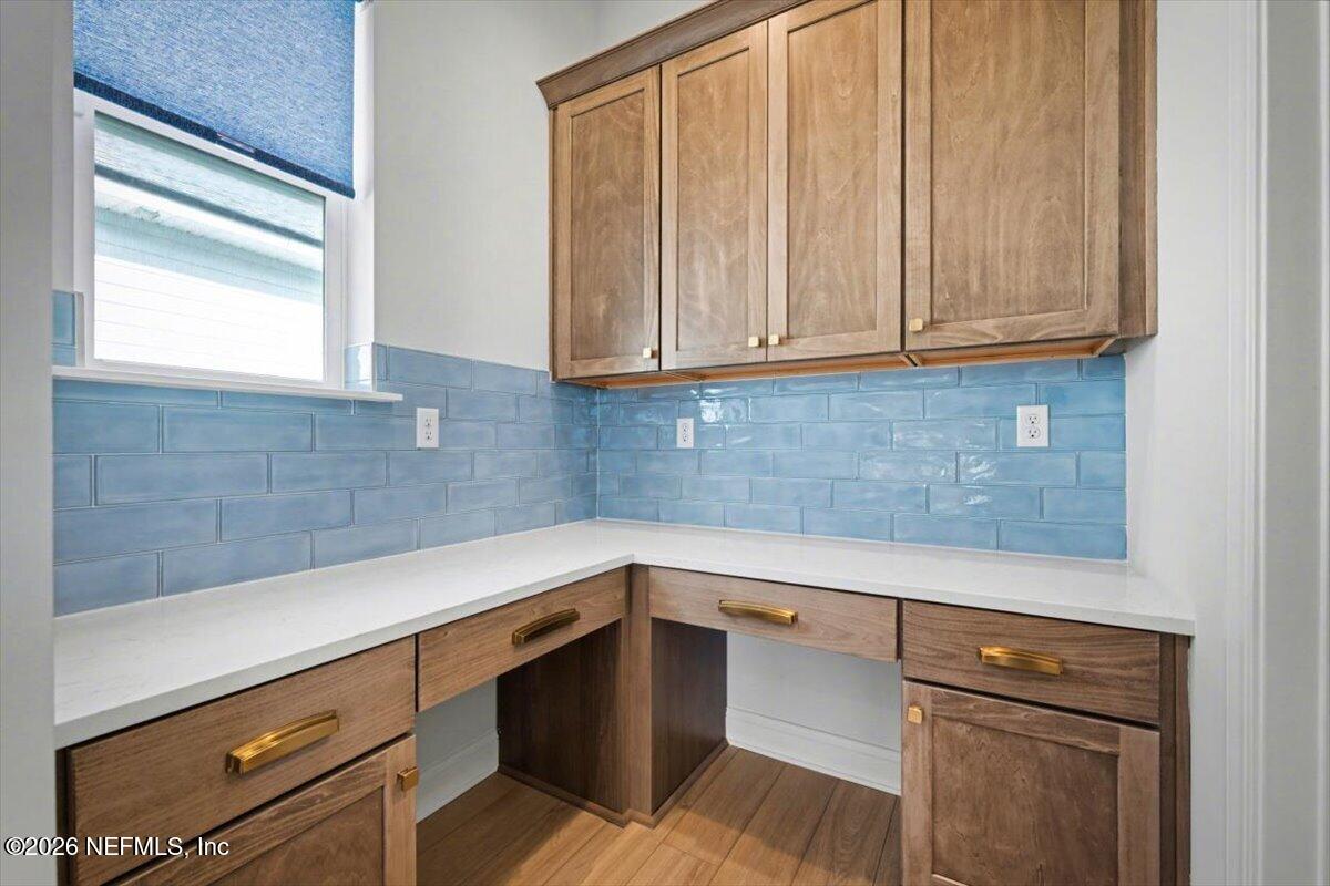 113 Grand Rivage Drive St. Augustine, FL 32092 - Photo 16 of 24 a kitchen with a sink and cabinets