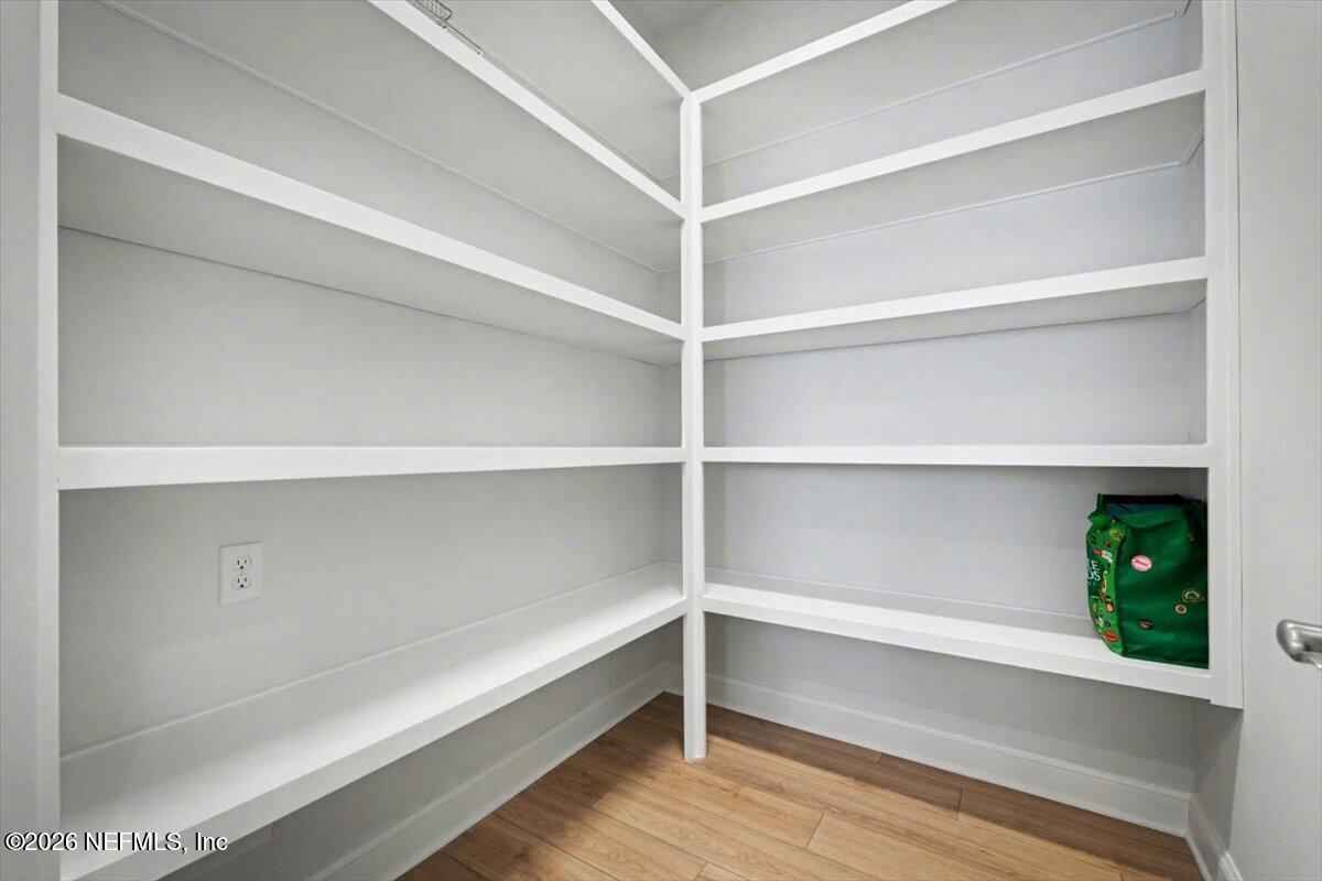 113 Grand Rivage Drive St. Augustine, FL 32092 - Photo 17 of 24 a view of walk in closet with empty racks