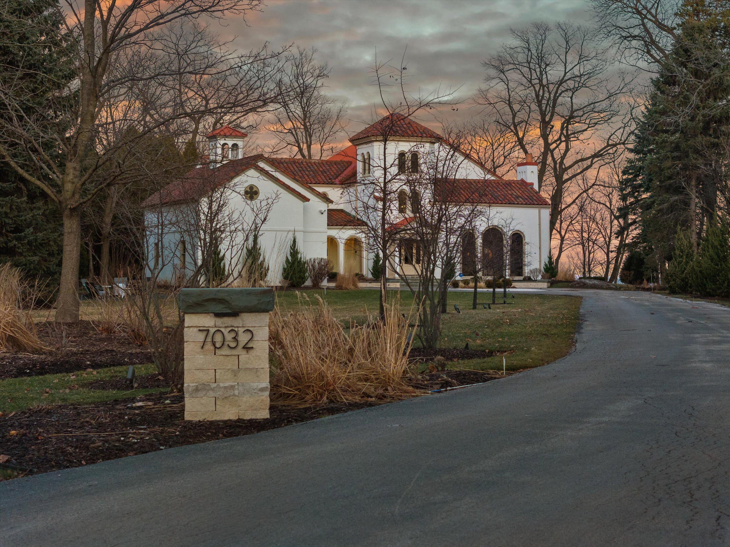 7032 North Barnett Lane Fox Point, WI 53217 - Photo 2 of 53 066-DJI_20260211115836_0844_D