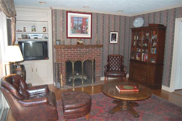 710 Barretts Mill Road Concord, MA 01742 - Photo 9 of 21 a living room with furniture and a fireplace