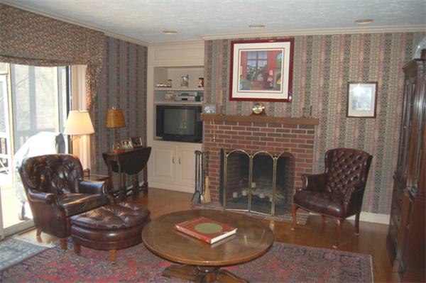 710 Barretts Mill Road Concord, MA 01742 - Photo 10 of 21 a living room with furniture and a fireplace