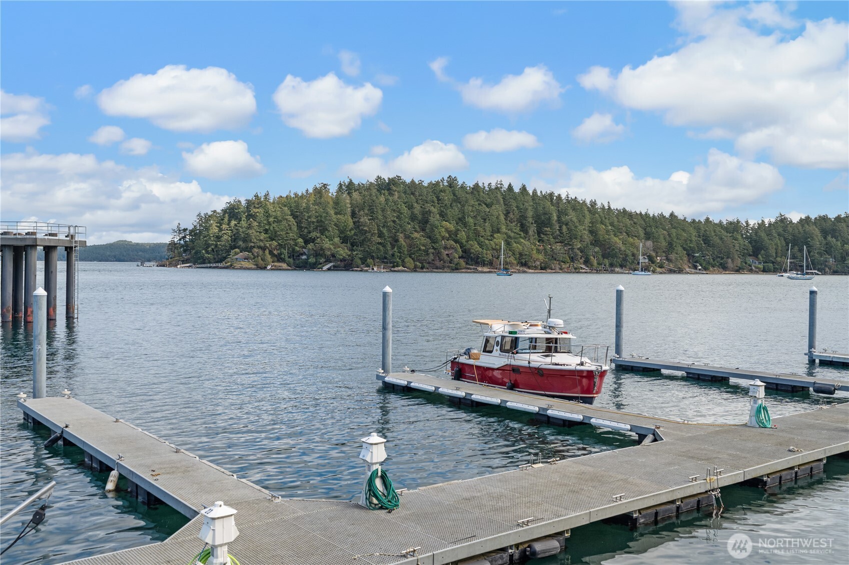 0 Warbass Way, Unit 5 Friday Harbor, WA 98250 - Photo 19 of 22 a view of a terrace with furniture and a potted plant