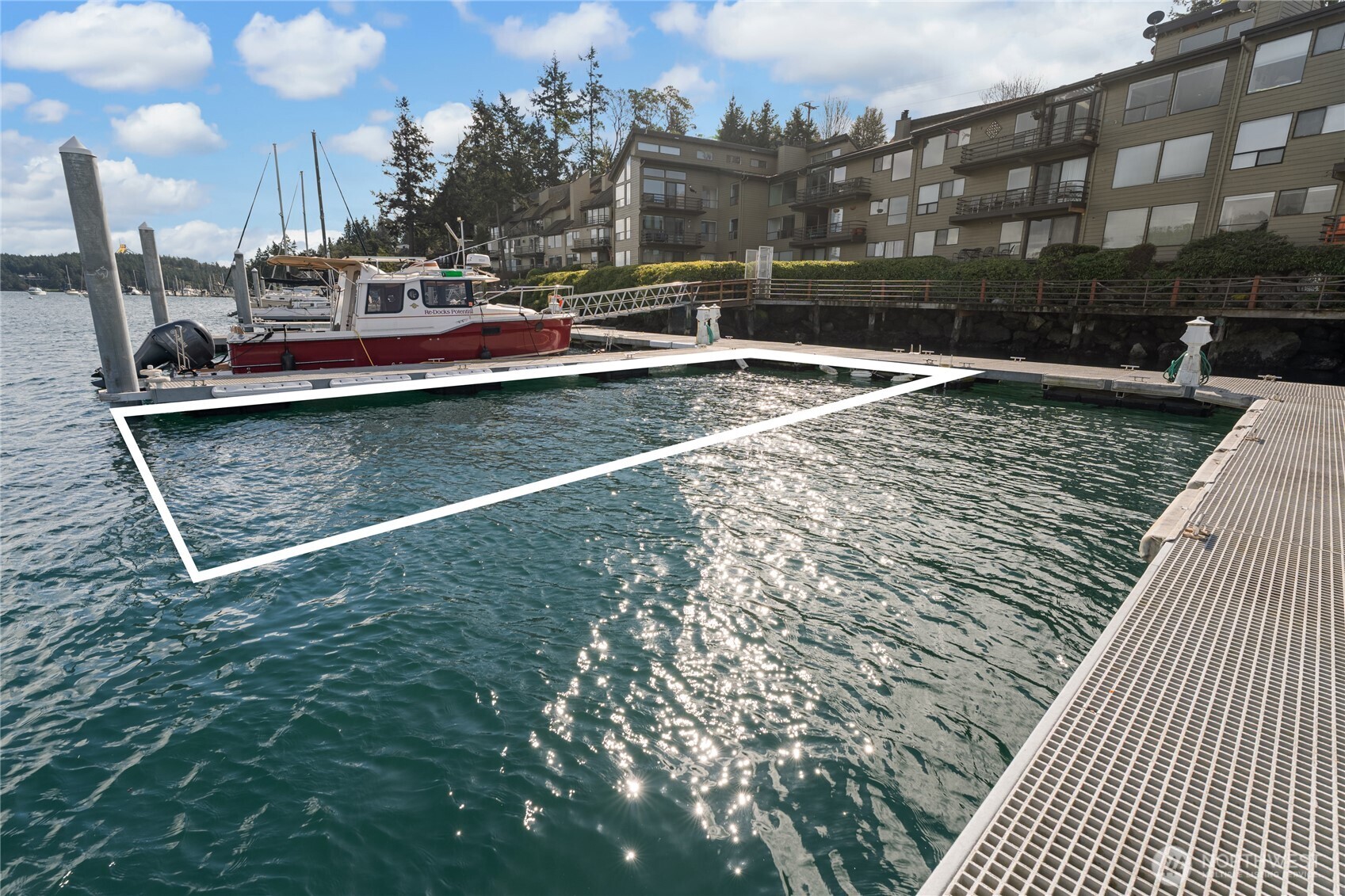 0 Warbass Way, Unit 5 Friday Harbor, WA 98250 - Photo 2 of 22 a view of a swimming pool with outdoor seating