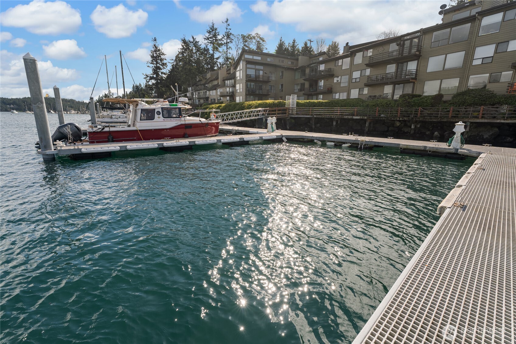 0 Warbass Way, Unit 5 Friday Harbor, WA 98250 - Photo 21 of 22 a view of yard with boat and trees in the background
