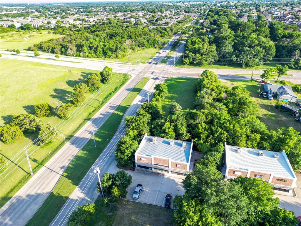 727 East Pleasant Run Road Cedar Hill, TX 75104 - Photo 18 of 23 an aerial view of a house with a lake view