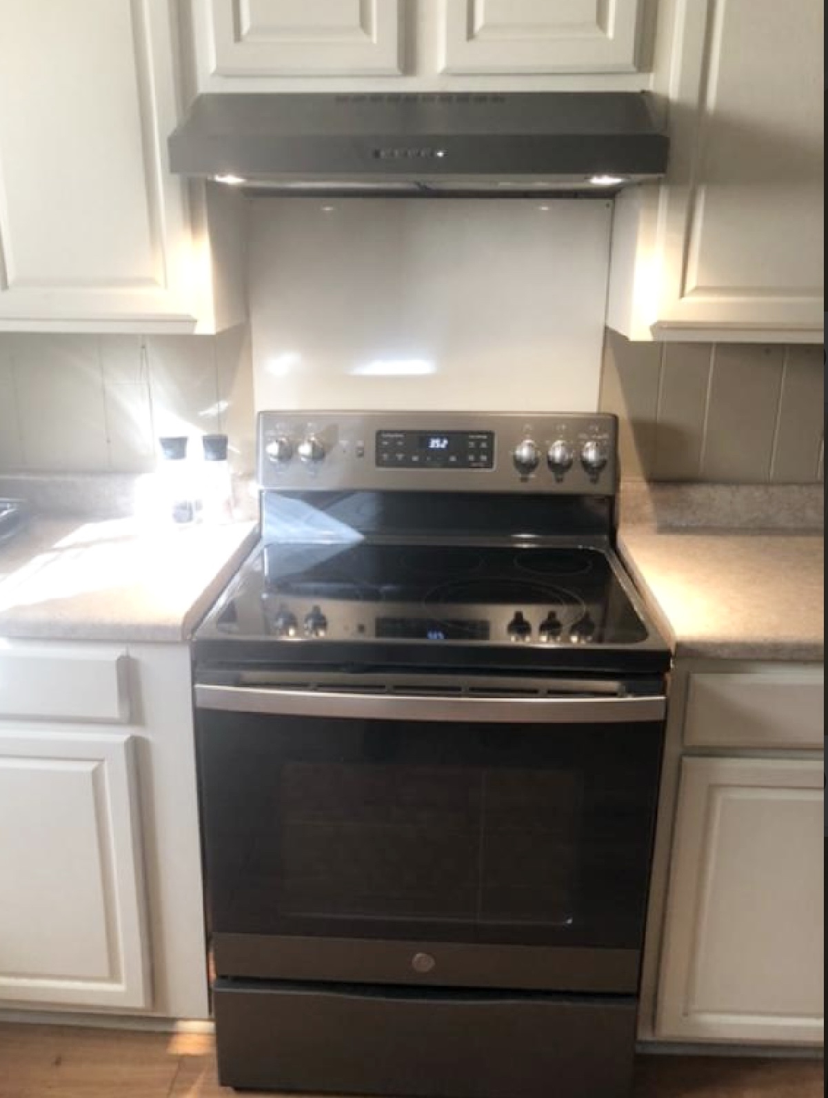 10355 Godwin Road Arlington, TN 38002 - Photo 3 of 13 a stove top oven sitting inside of a kitchen