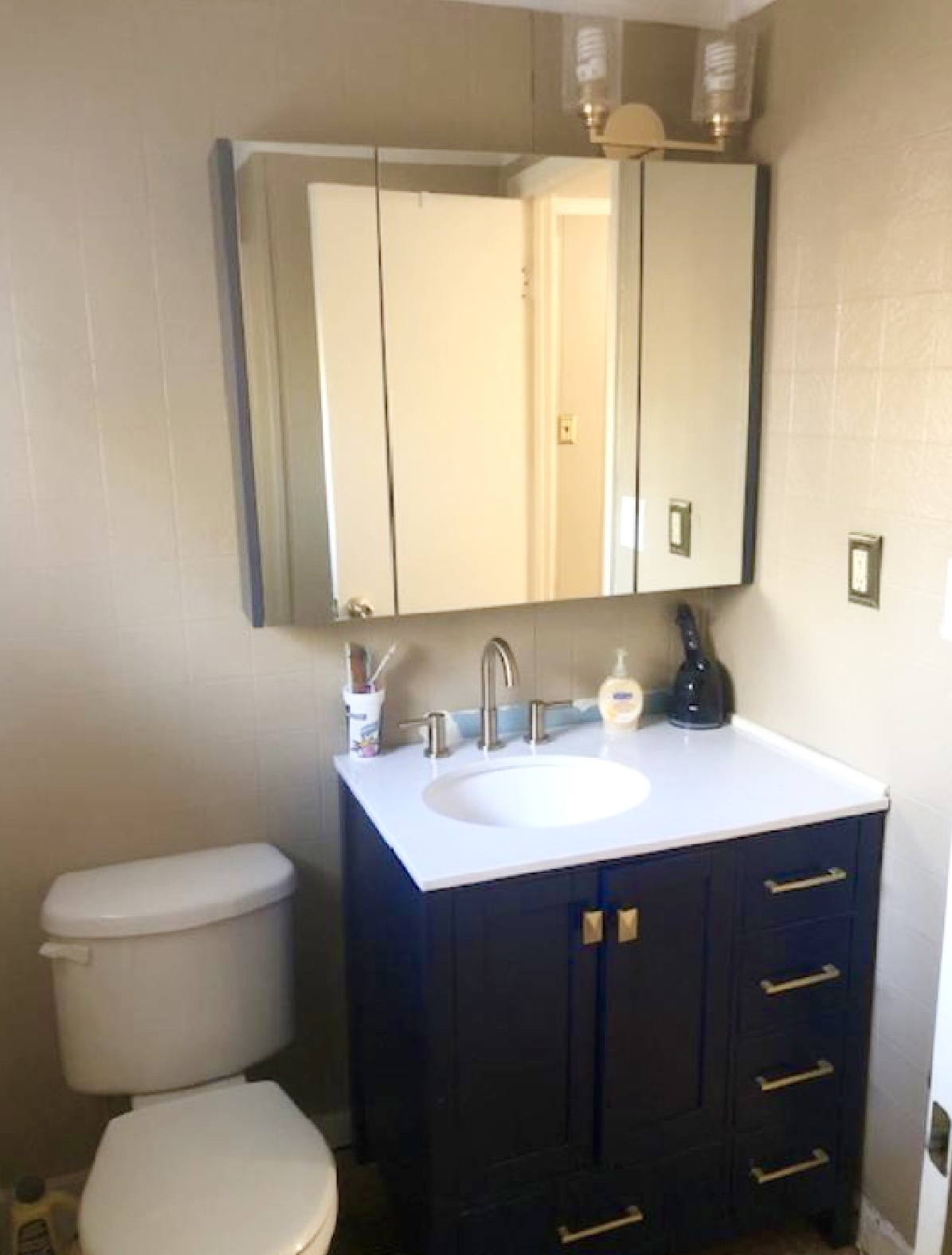 10355 Godwin Road Arlington, TN 38002 - Photo 4 of 13 a bathroom with a toilet sink and mirror