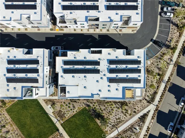a view of a large building with a lake view