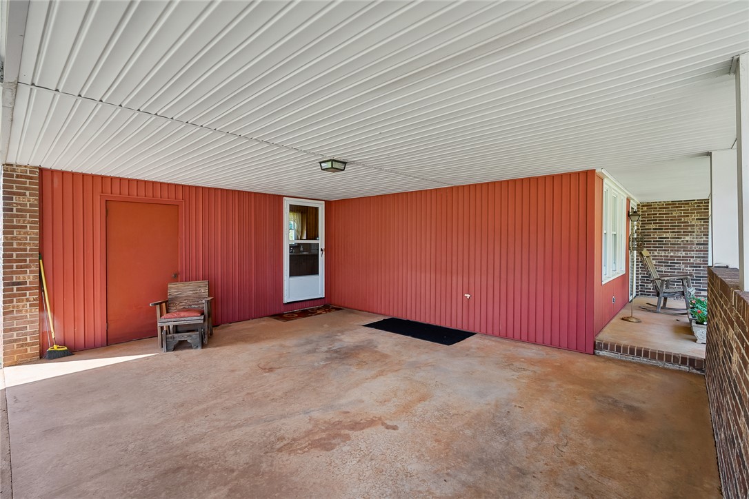 312 Edwards Drive Anderson, SC 29626 - Photo 27 of 44 A spacious covered patio provides a delightful outdoor living extension.