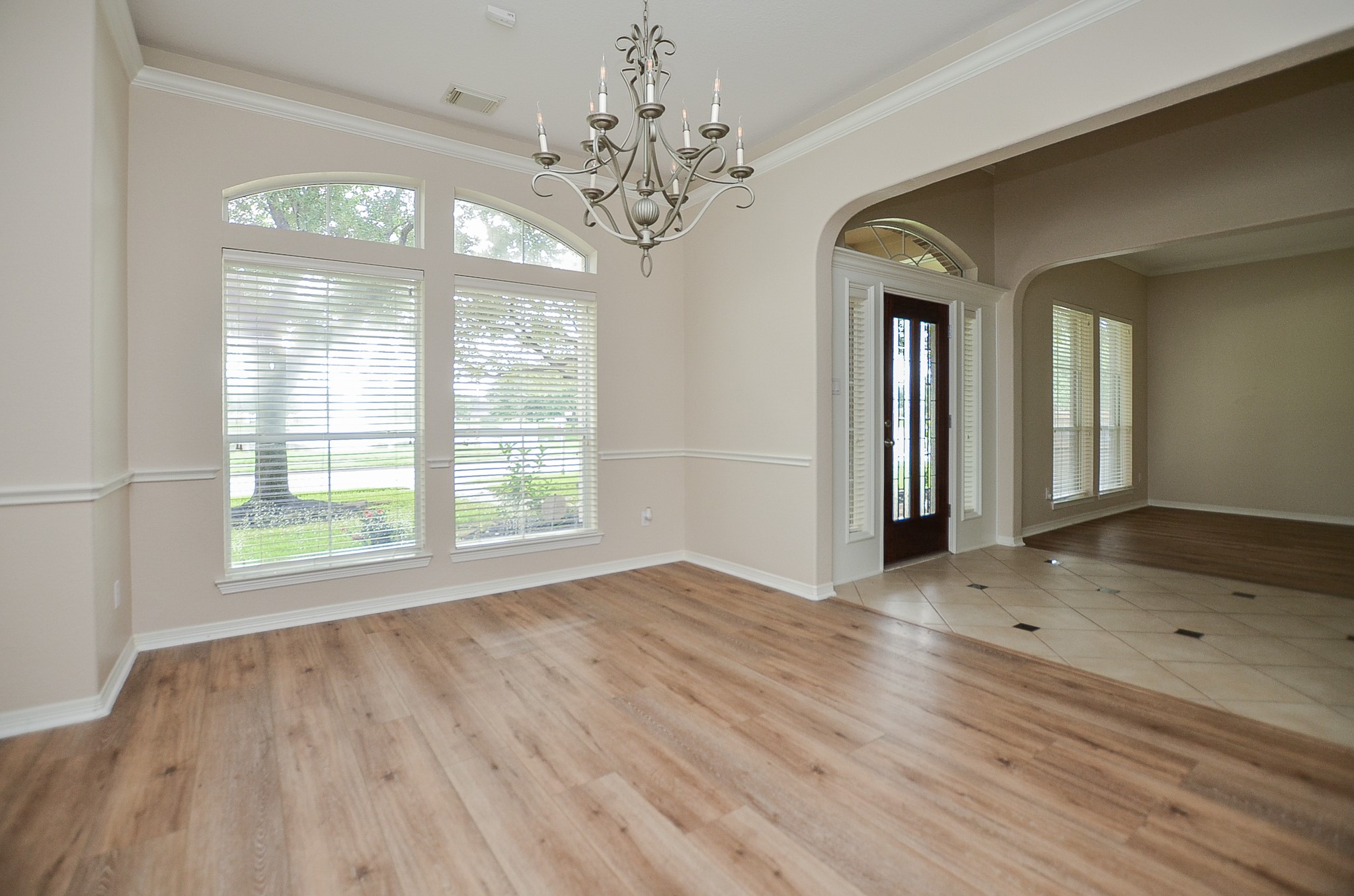 7218 Spring Run Lane Katy, TX 77494 - Photo 8 of 49 wooden floor in an empty room with a window