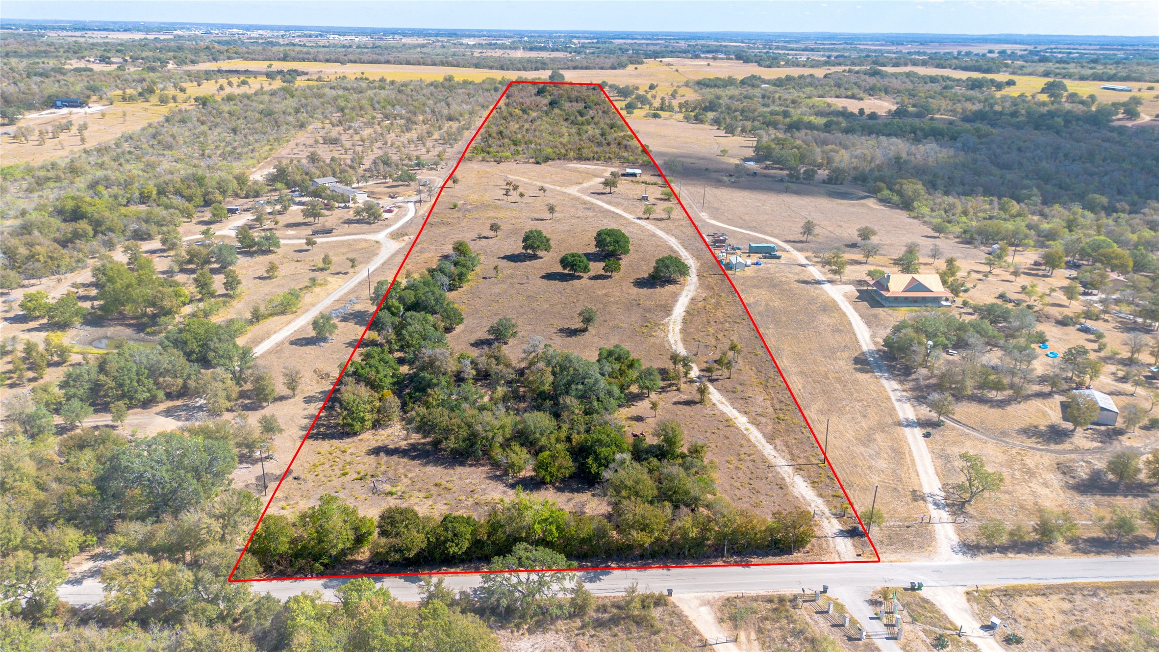 2364 Westwood Road Lockhart, TX 78644 - Photo 1 of 25 a view of a lake with a mountain view