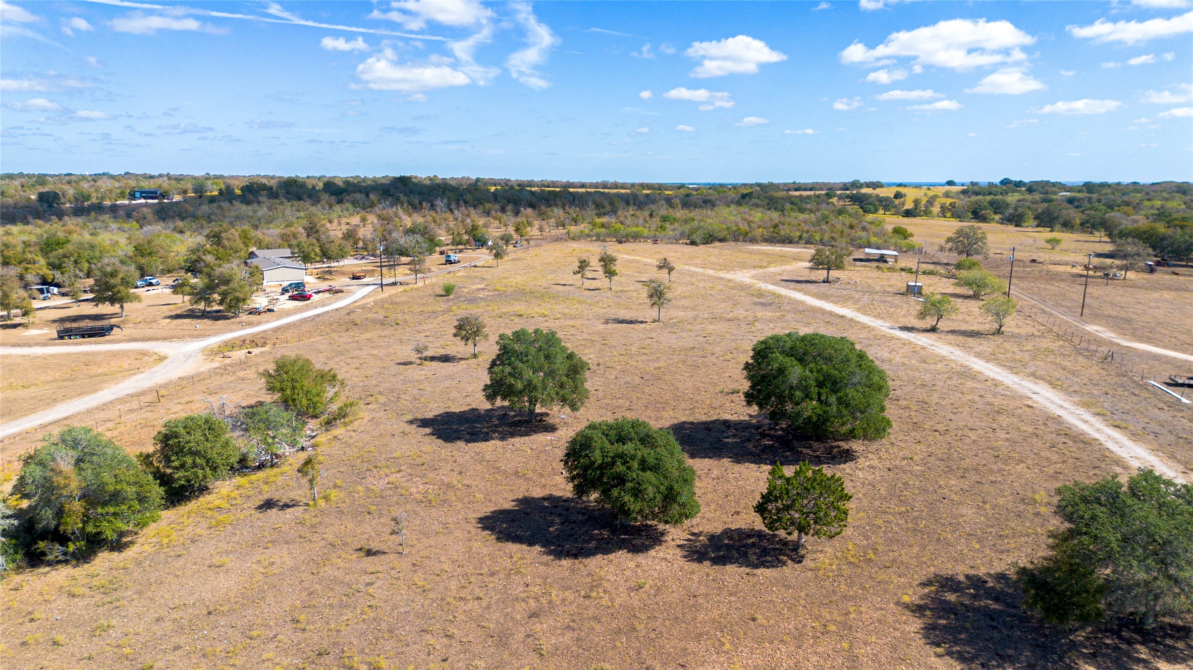 2364 Westwood Road Lockhart, TX 78644 - Photo 13 of 25 a view of a lake with a beach