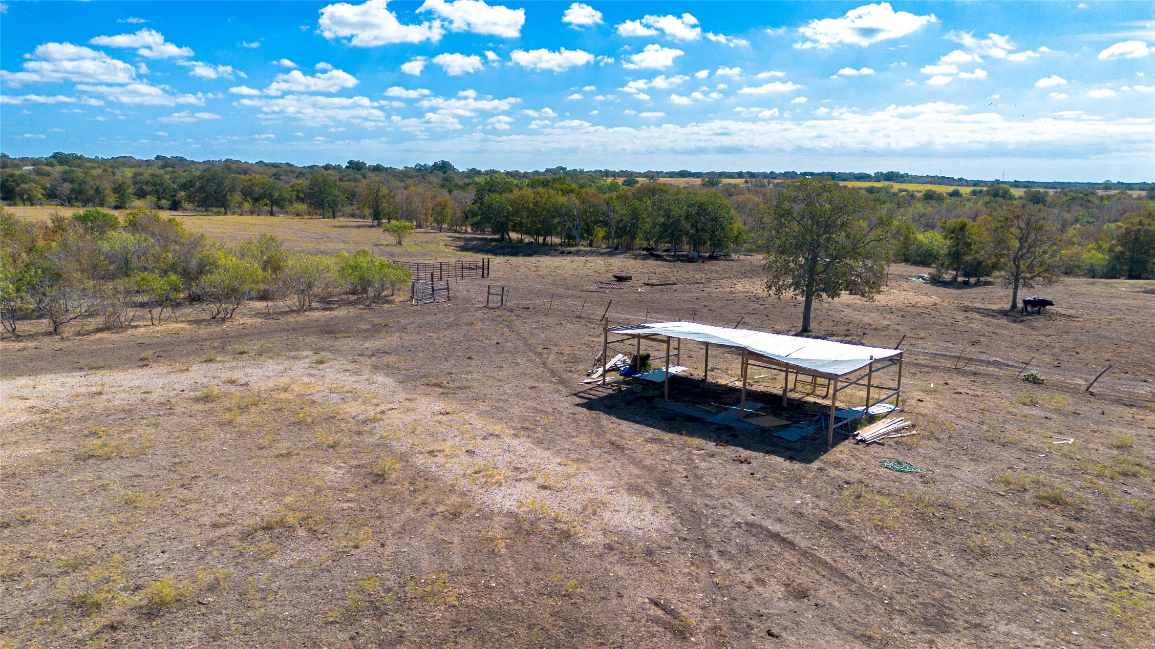 2364 Westwood Road Lockhart, TX 78644 - Photo 15 of 25 a backyard of a house with table and chairs