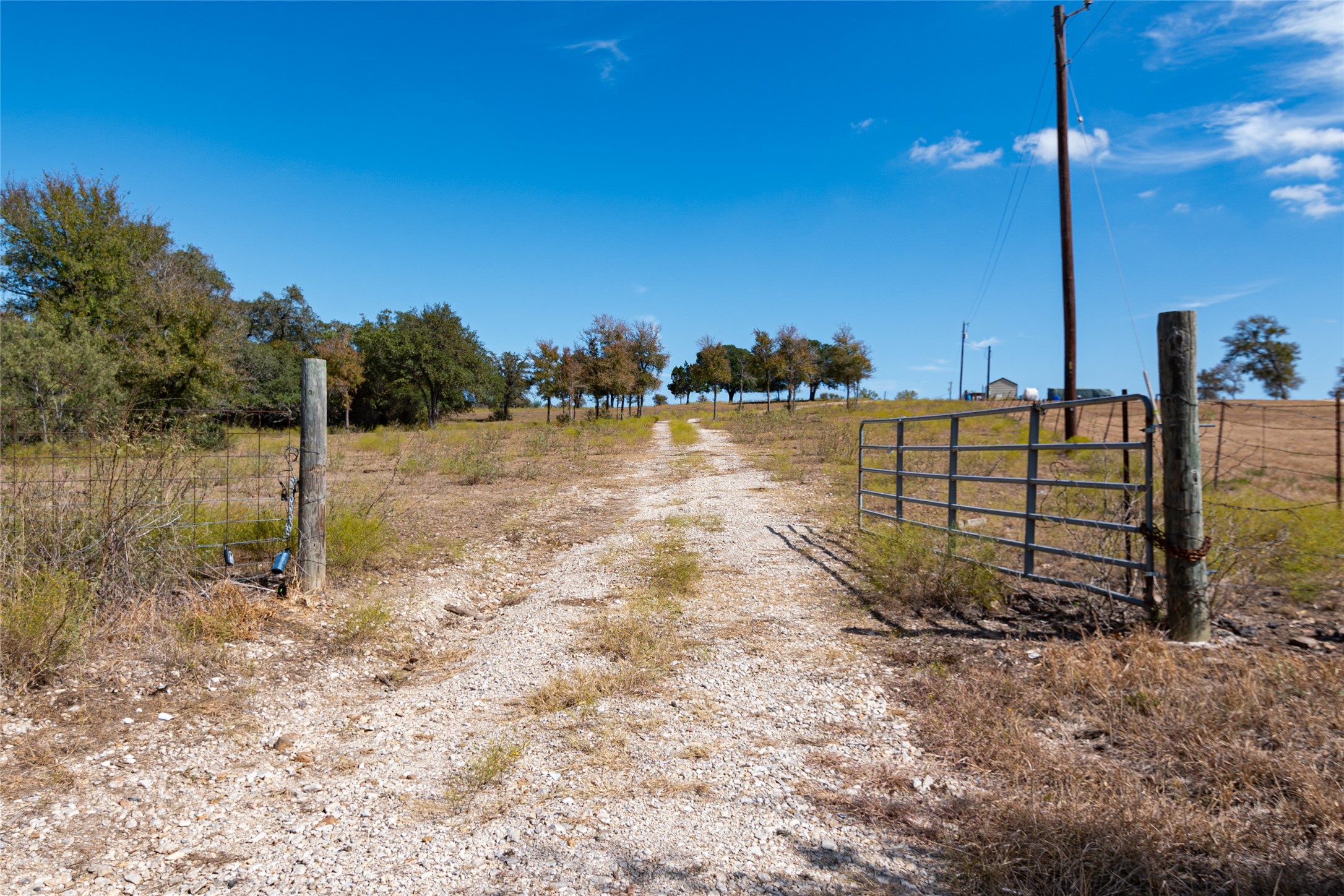 2364 Westwood Road Lockhart, TX 78644 - Photo 2 of 25 a view of a lake with a house