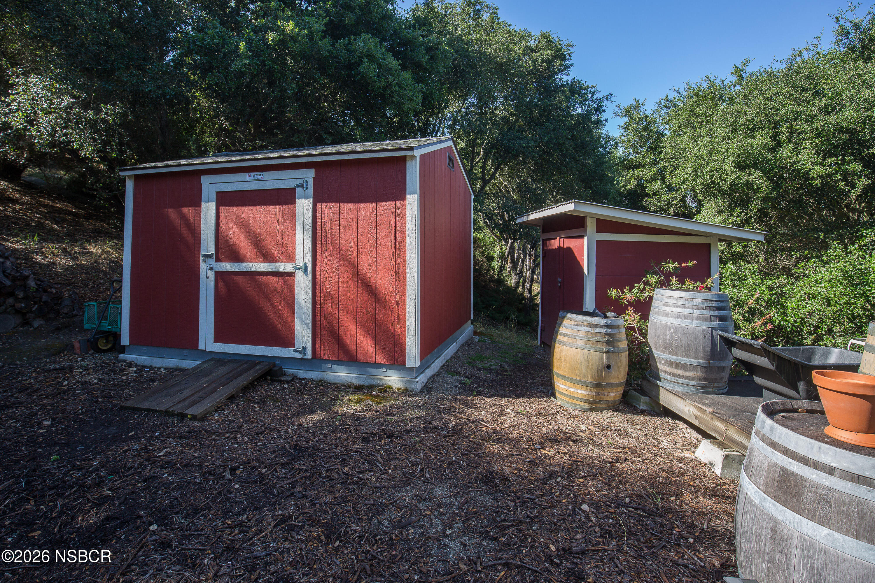850 Fredensborg Canyon Road Solvang, CA 93463 - Photo 26 of 26 a view of a backyard with plants and trees