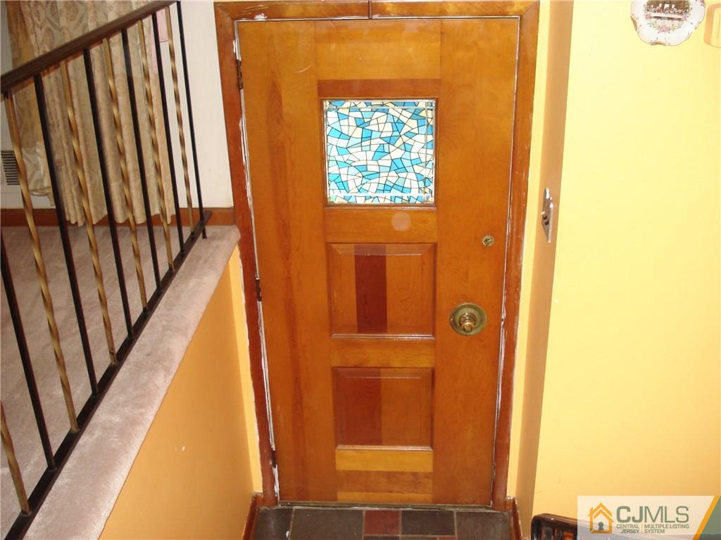 10 Morningside Road Colonia, NJ 07067 - Photo 2 of 18 a view of balcony with wooden floor