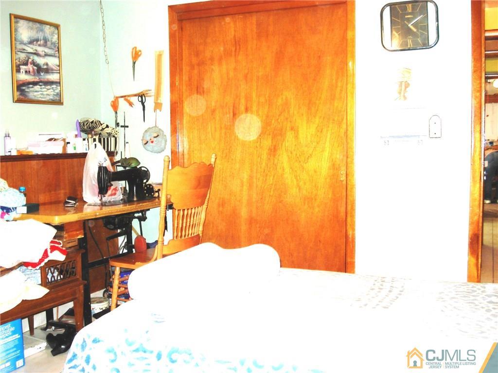 10 Morningside Road Colonia, NJ 07067 - Photo 12 of 18 a bedroom with a bed and a cabinets