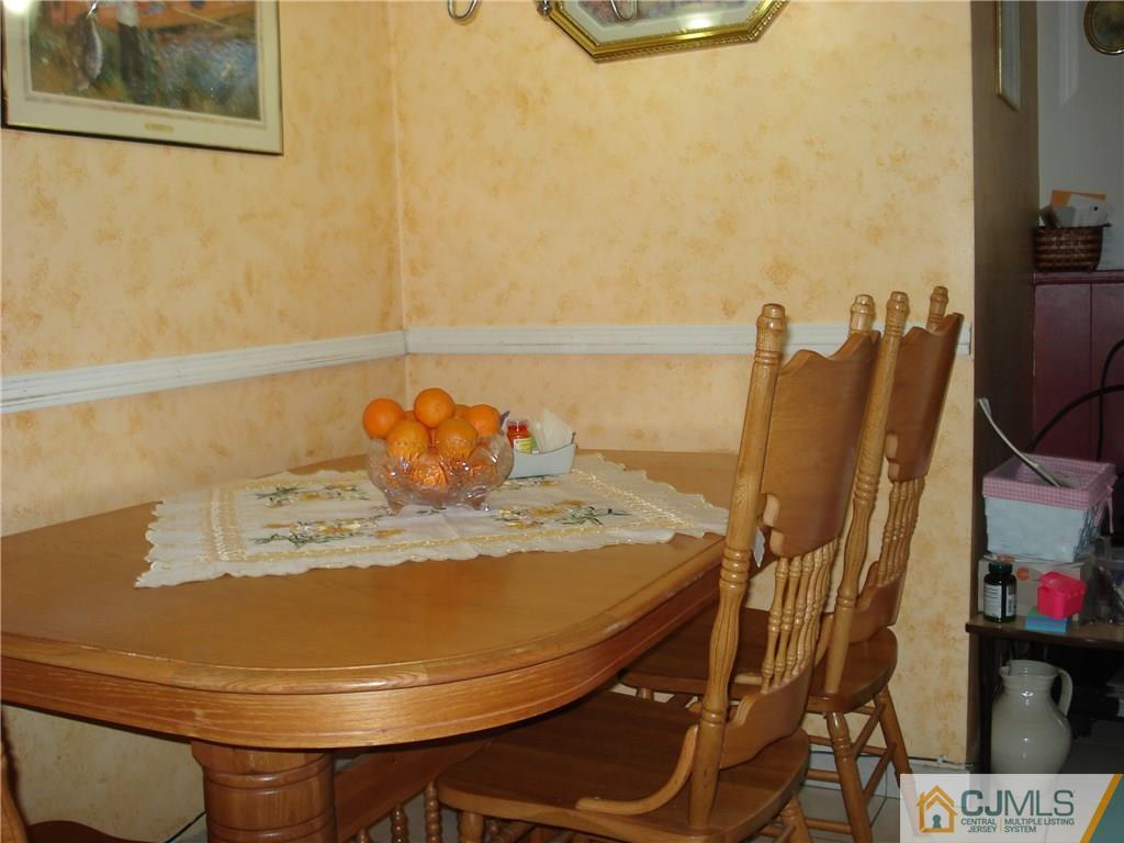 10 Morningside Road Colonia, NJ 07067 - Photo 13 of 18 a close view of dining table and chairs