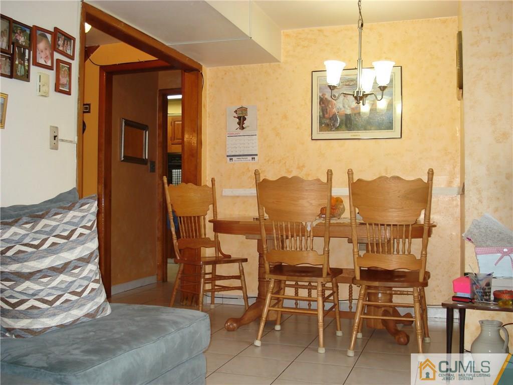 10 Morningside Road Colonia, NJ 07067 - Photo 14 of 18 a view of a dining room with furniture