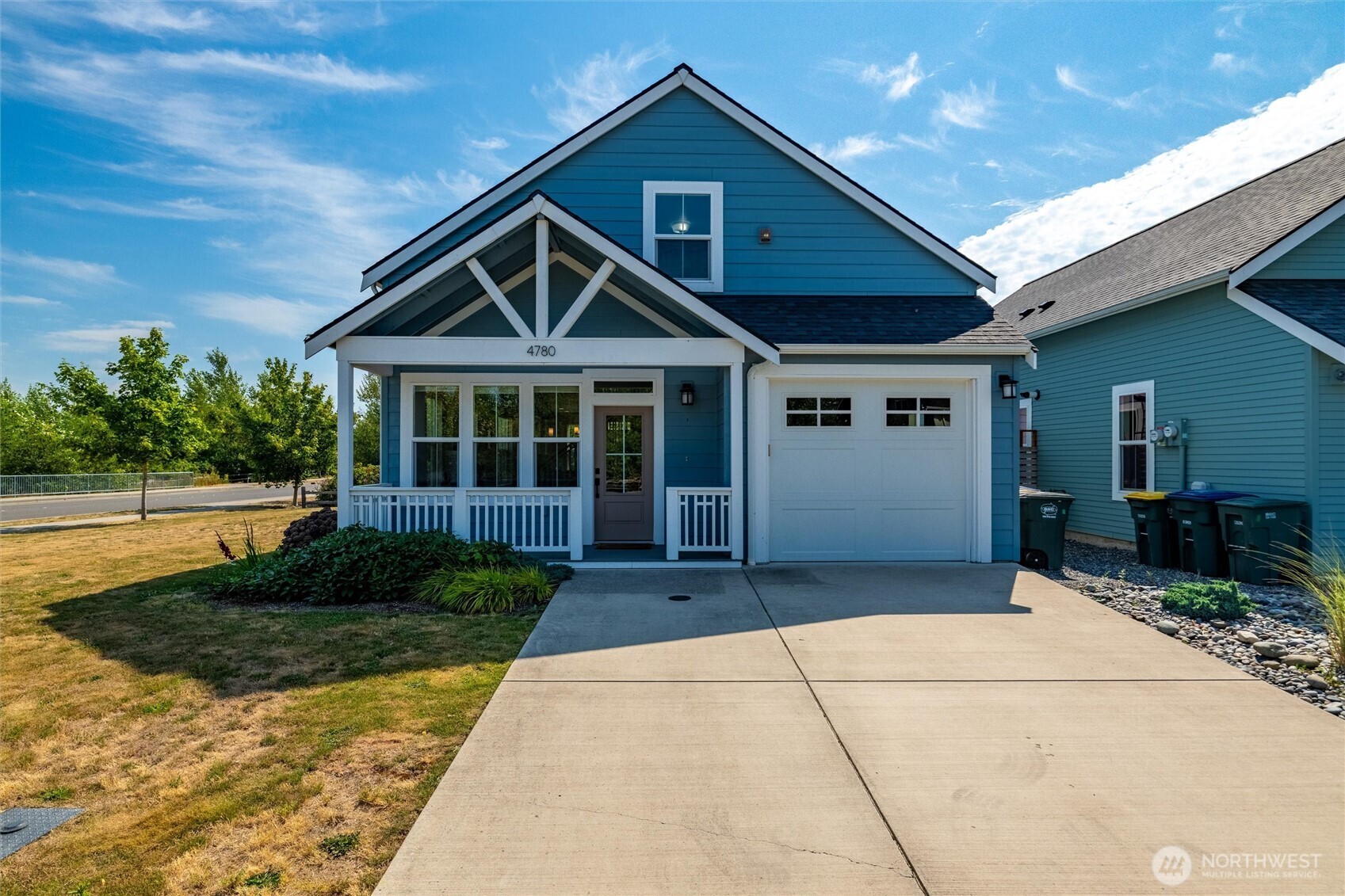 4780 Spring Brook Street Bellingham, WA 98226 - Photo 1 of 40 a front view of a house with garden