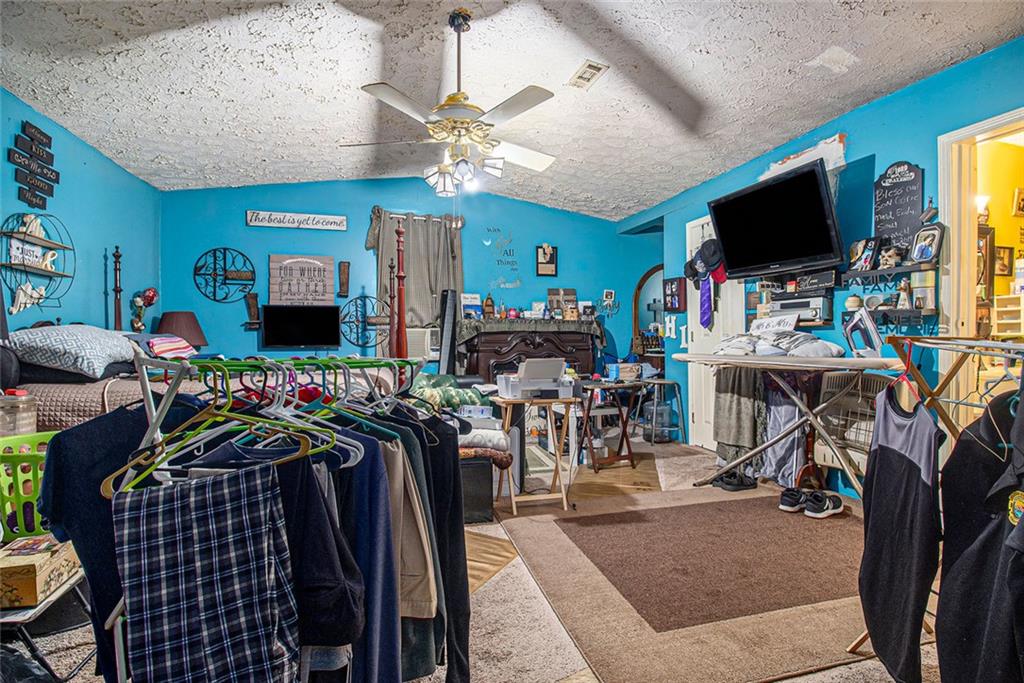 399 Rudy York Road Northwest Cartersville, GA 30121 - Photo 16 of 25 a view of a room with gym equipment