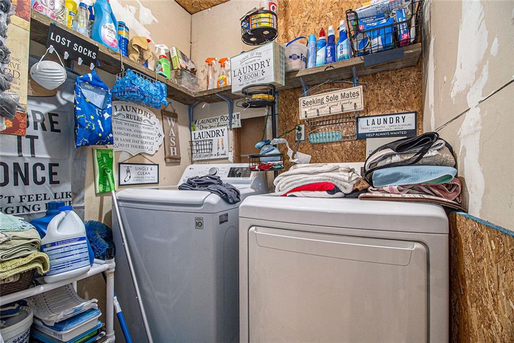 399 Rudy York Road Northwest Cartersville, GA 30121 - Photo 18 of 25 a utility room with dryer and washer