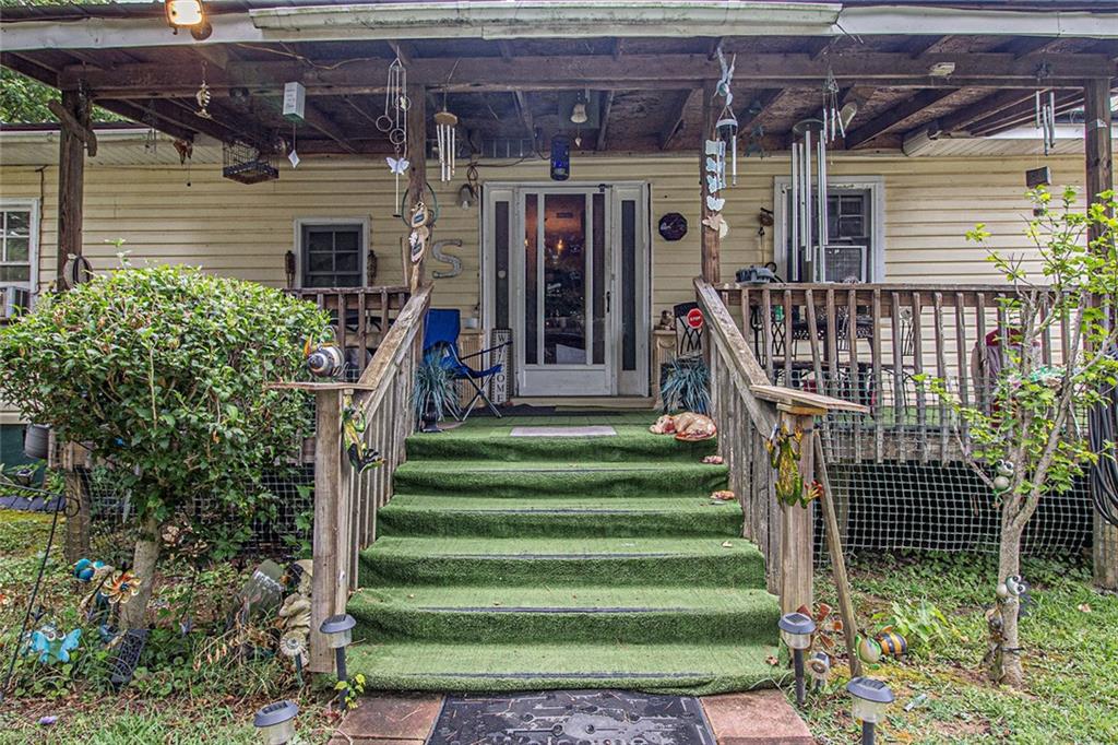 399 Rudy York Road Northwest Cartersville, GA 30121 - Photo 2 of 25 a front view of a house with a small yard