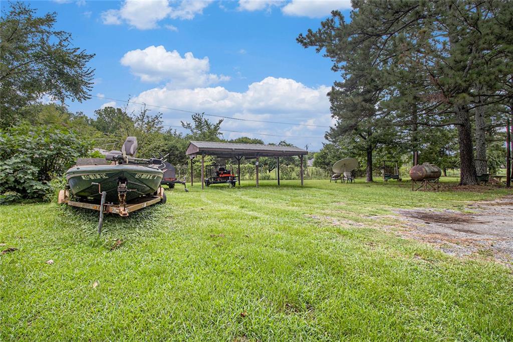 399 Rudy York Road Northwest Cartersville, GA 30121 - Photo 22 of 25 a view of a swimming pool with a yard
