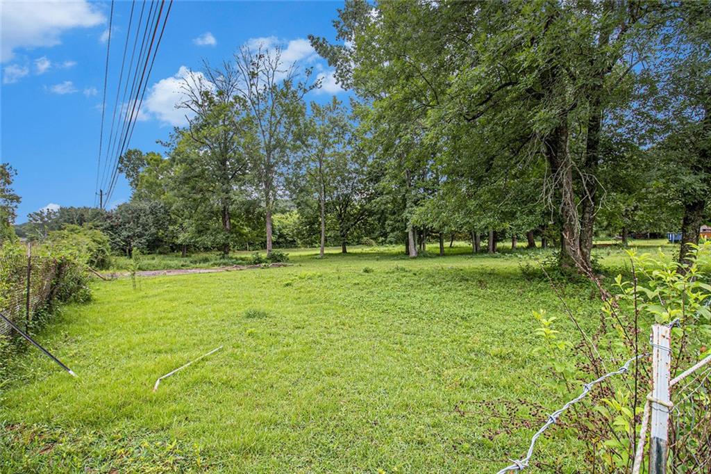 399 Rudy York Road Northwest Cartersville, GA 30121 - Photo 25 of 25 a view of outdoor space with deck and yard