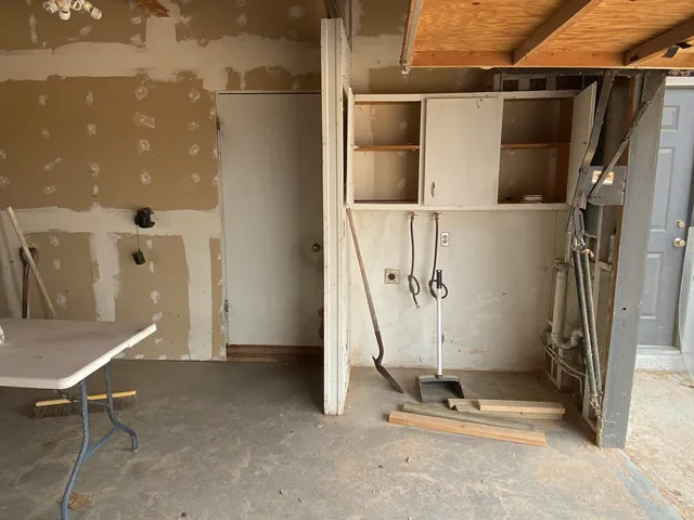 a view of a room with rack on the wall