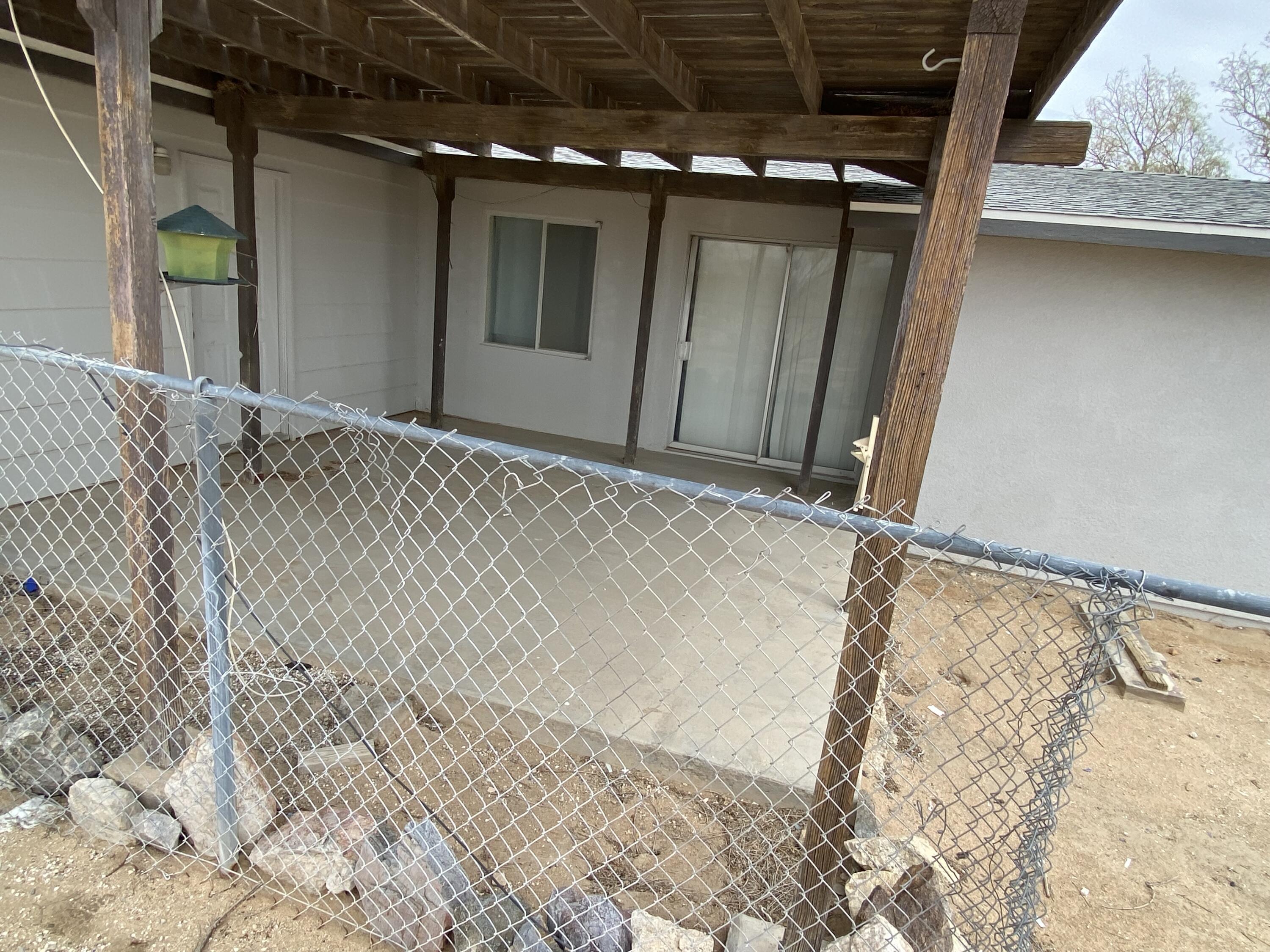 63325 Mesa Verde Joshua Tree, CA 92252 - Photo 14 of 39 a view of a room with wooden floor