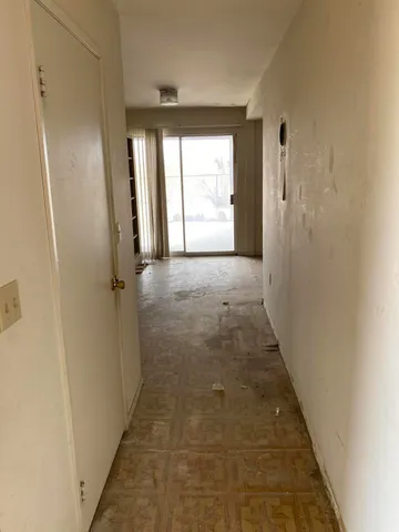 an empty room with windows