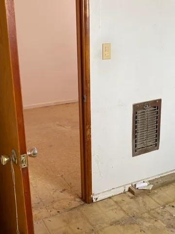 a view of a room with windows