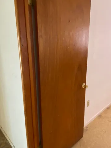 a view of a livingroom with furniture and windows