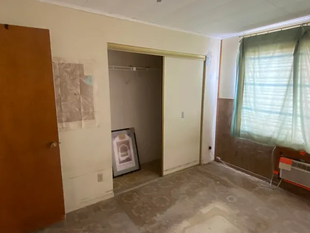 an empty room with window