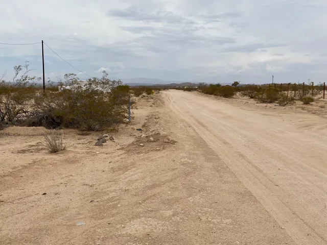 a view of a lake with a beach