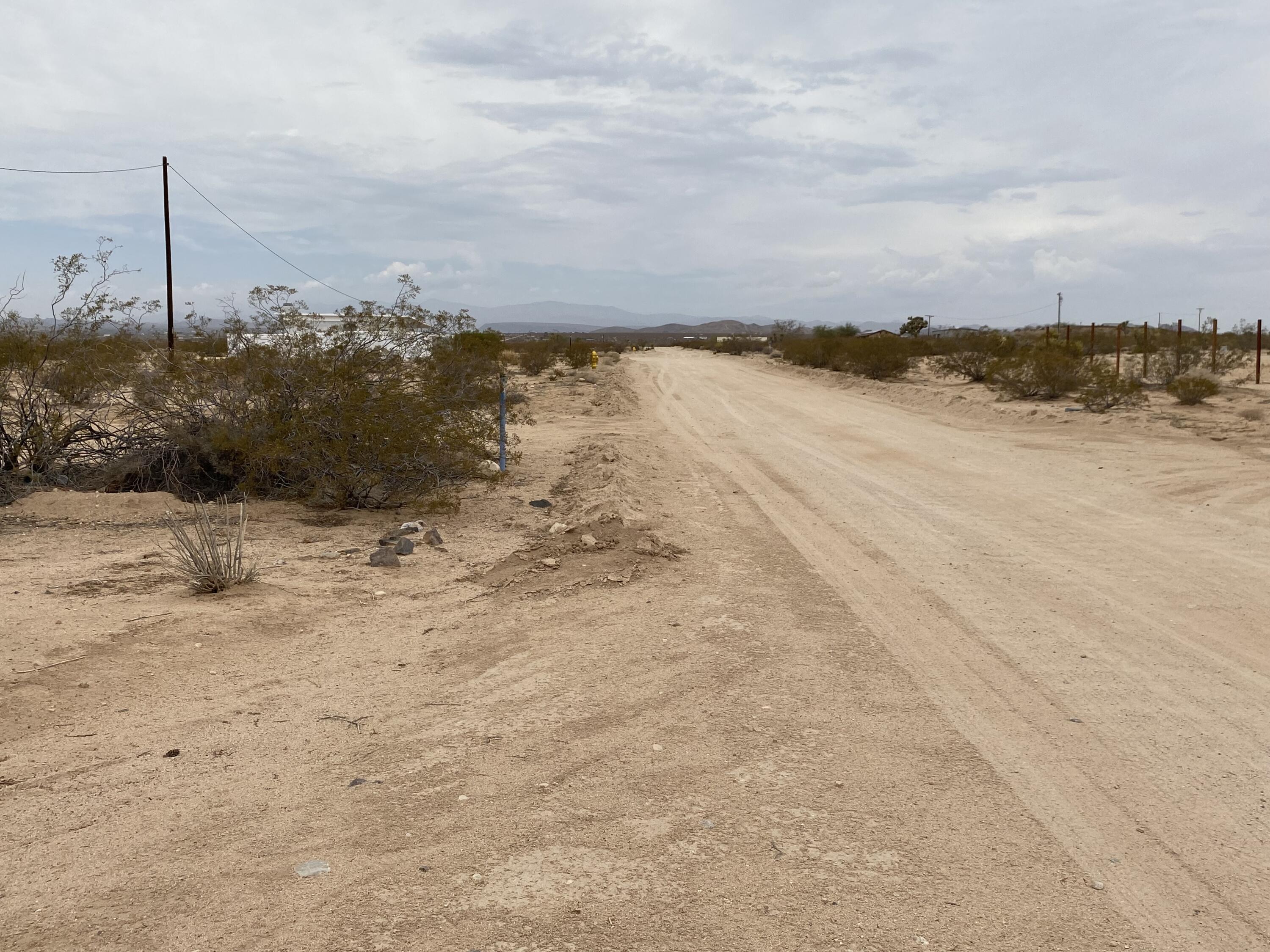 63325 Mesa Verde Joshua Tree, CA 92252 - Photo 5 of 39 a view of a lake with a beach