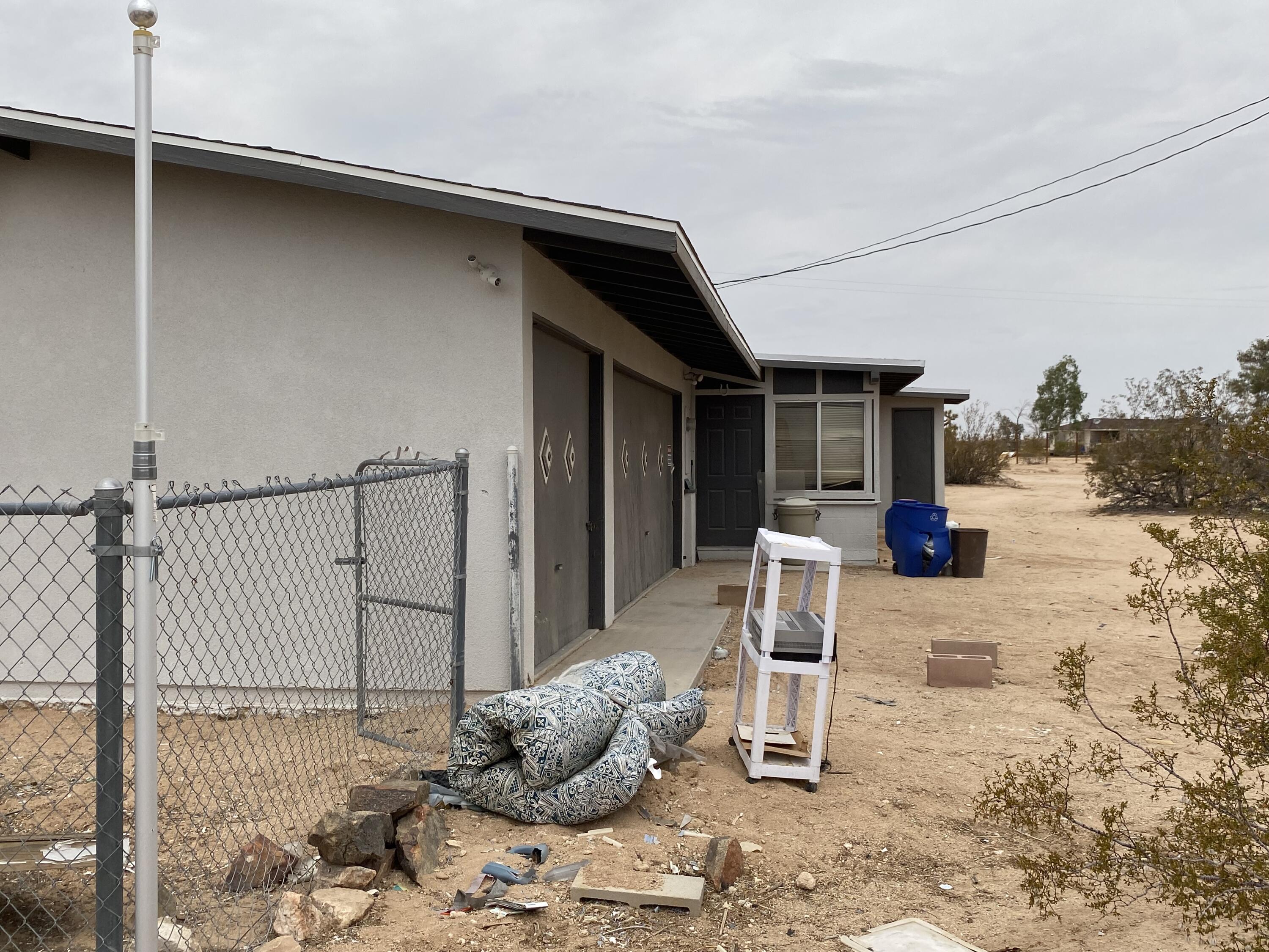 63325 Mesa Verde Joshua Tree, CA 92252 - Photo 7 of 39 a bedroom with a bed and a window