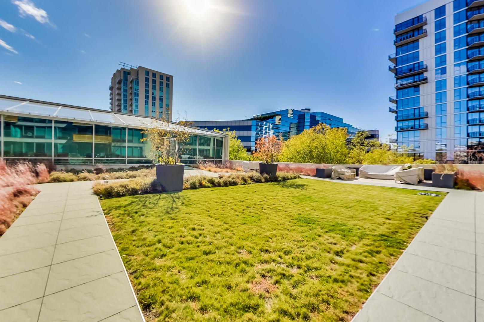 1720 Maple Avenue, Unit 1360 Evanston, IL 60201 - Photo 29 of 37 a swimming pool with outdoor seating and yard
