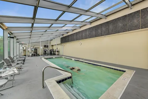 a view of a street with cars