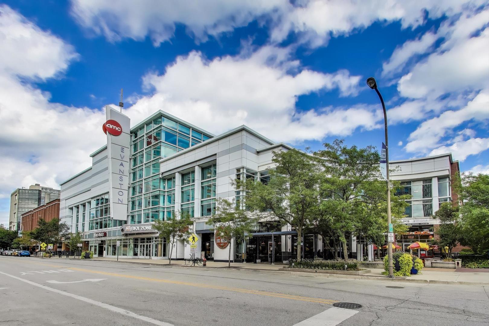 1720 Maple Avenue, Unit 1360 Evanston, IL 60201 - Photo 32 of 37 a city street lined with buildings and trees