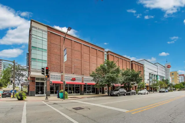 a view of a building with a street